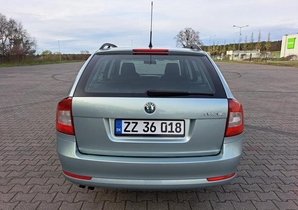 Skoda Octavia cena 24800 przebieg: 153000, rok produkcji 2009 z Pabianice małe 352